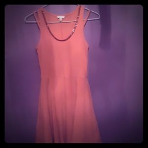 Cute pink dress with scoop.